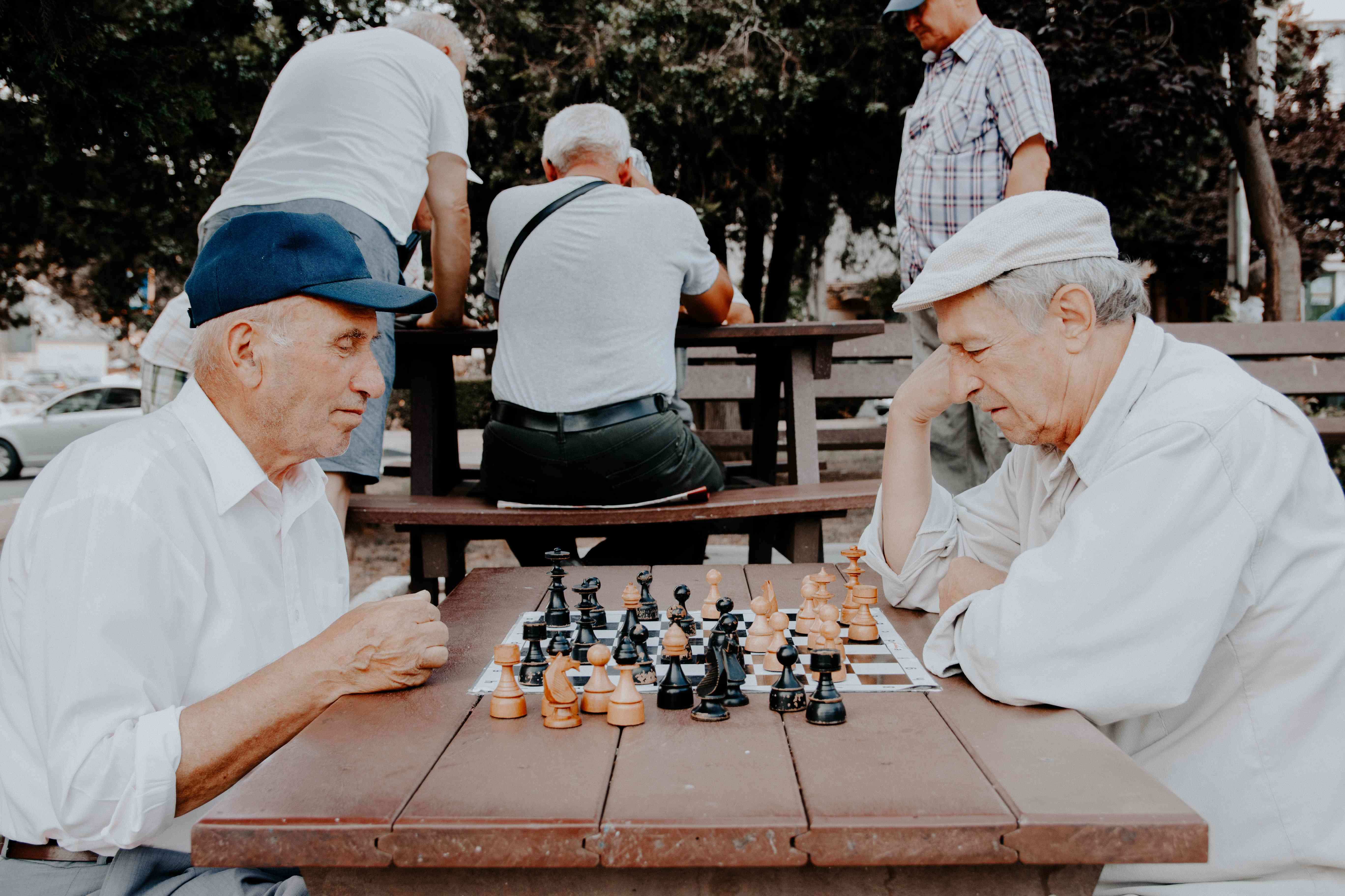 old people playing chess